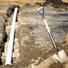 french drain, shovel, digging, pipe